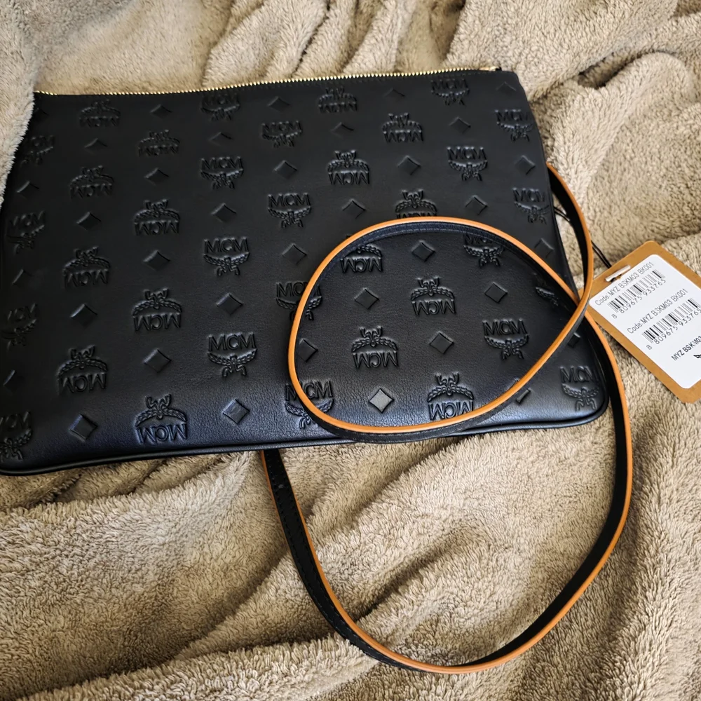 MCM Black Embossed Men's Bag